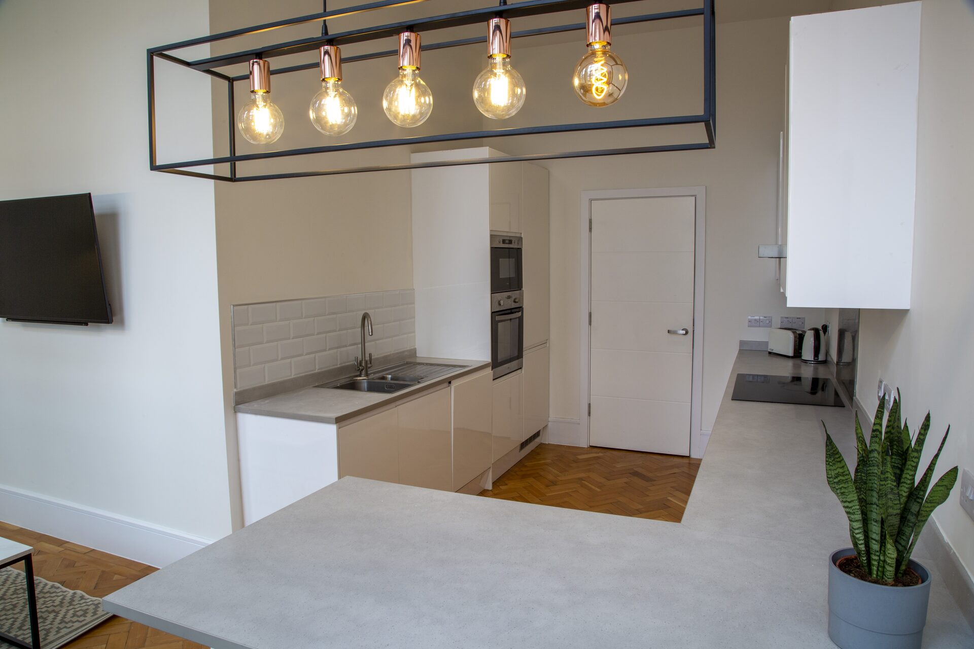 Modern fitted kitchen with integrated appliances